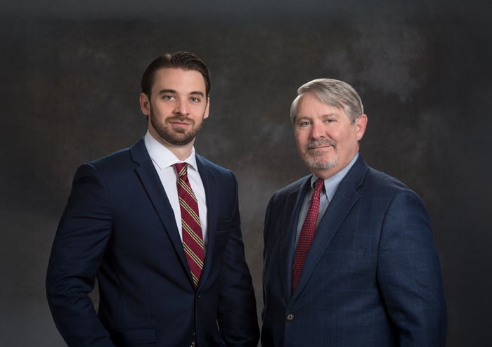 Attorneys J. Michael Lins And D. Michael Lins